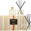 NEST New York Festive Petite Diffuser Trio – 1.3 fl oz Each – Includes Holiday, Birchwood Pine, and Blue Cypress & Snow – Fragrance for Up to 90 Days – Includes All-Natural Reed Sticks – Flame Free